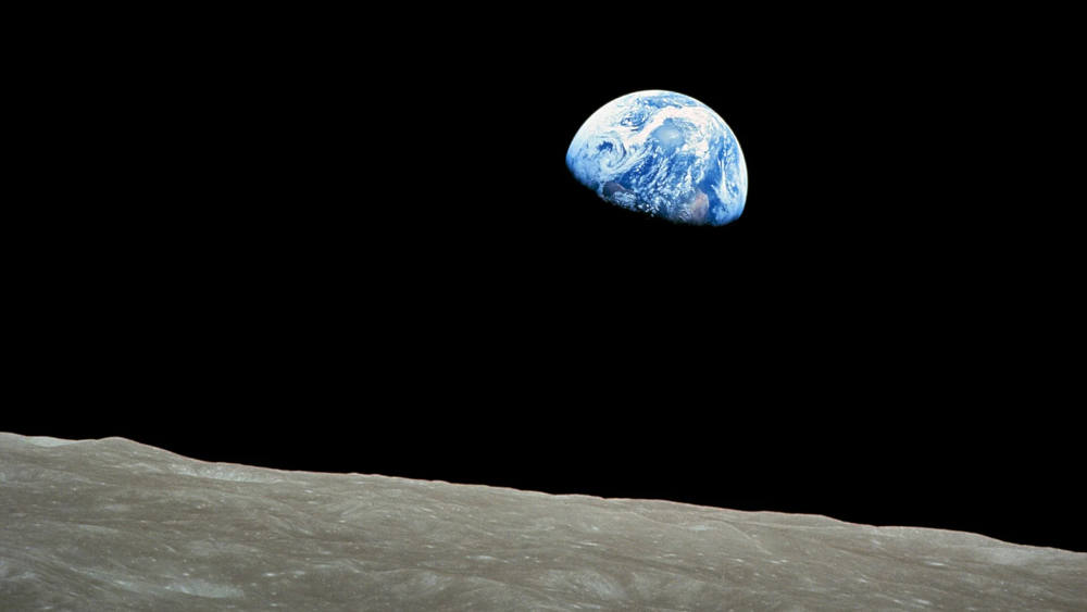 "Earthrise" is a famous photograph of the Earth and parts of the moon's surface taken from lunar orbit by astronaut Bill Anders on Dec. 24, 1968, during the Apollo 8 mission. (Bill Anders/NASA/Creative Commons)