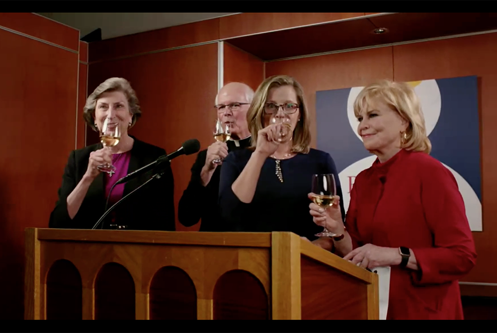 From left: Catholic Theological Union president Dominican Sr. Barbara Reid, board of trustees chair Fr. Jim Halstead, vice president for institutional advancement Colleen Kennedy, and event host Carol Marin share a toast in honor of Anthony Fauci and Chri From left: Catholic Theological Union president Dominican Sr. Barbara Reid, board of trustees chair Fr. Jim Halstead, vice president for institutional advancement Colleen Kennedy, and event host Carol Marin share a toast in honor of Anthony Fauci and Chri