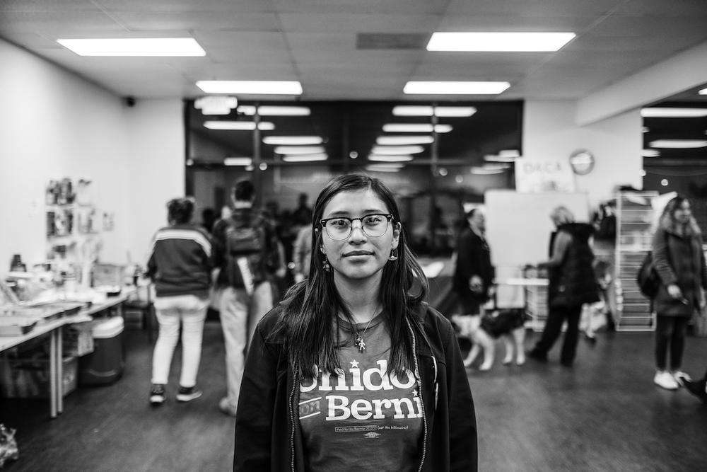 A Bernie Sanders supporter in Las Vegas in a "Unido con Bernie" T-shirt pictured ahead of the Nevada caucuses (Courtesy of Bear Guerra and Quiet Pictures)