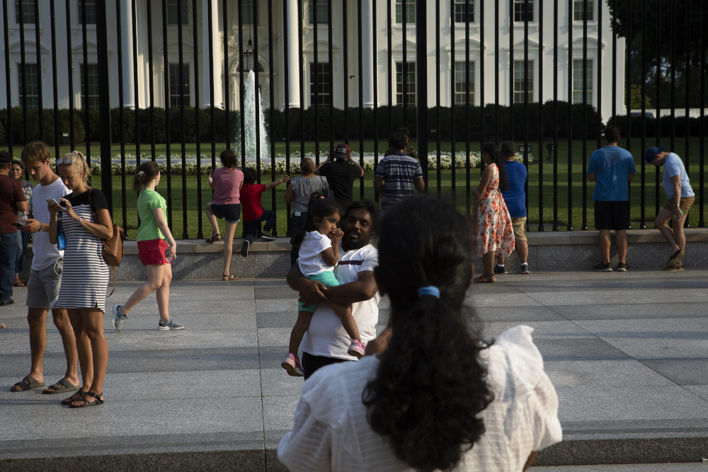 People are seen near the White House in Washington July 7. (CNS/Tyler Orsburn)
