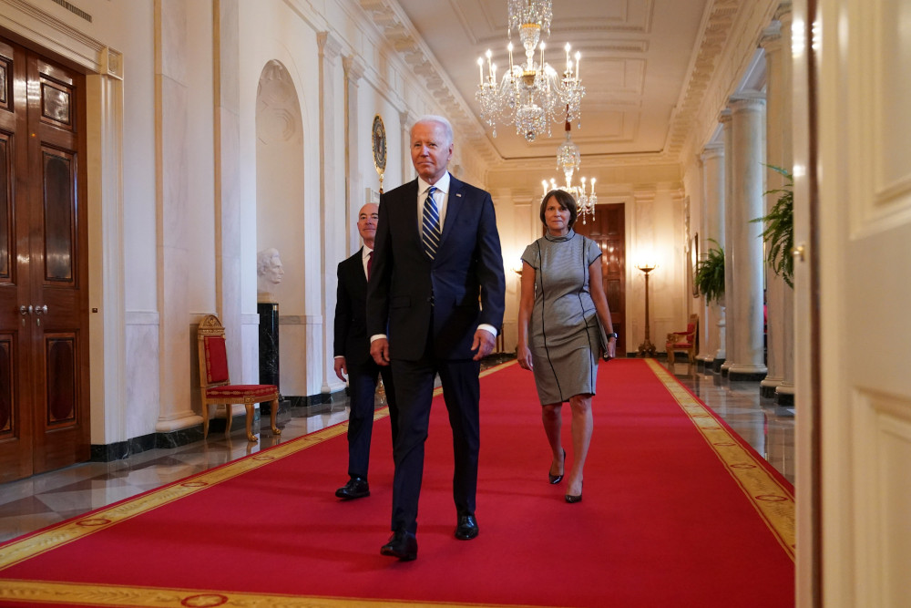 President Joe Biden arrives with Homeland Security Secretary Alejandro Mayorkas and Tracy Renaud, acting director of U.S. Citizenship and Immigration Services, for a naturalization ceremony at the White House July 2 in Washington. (CNS)