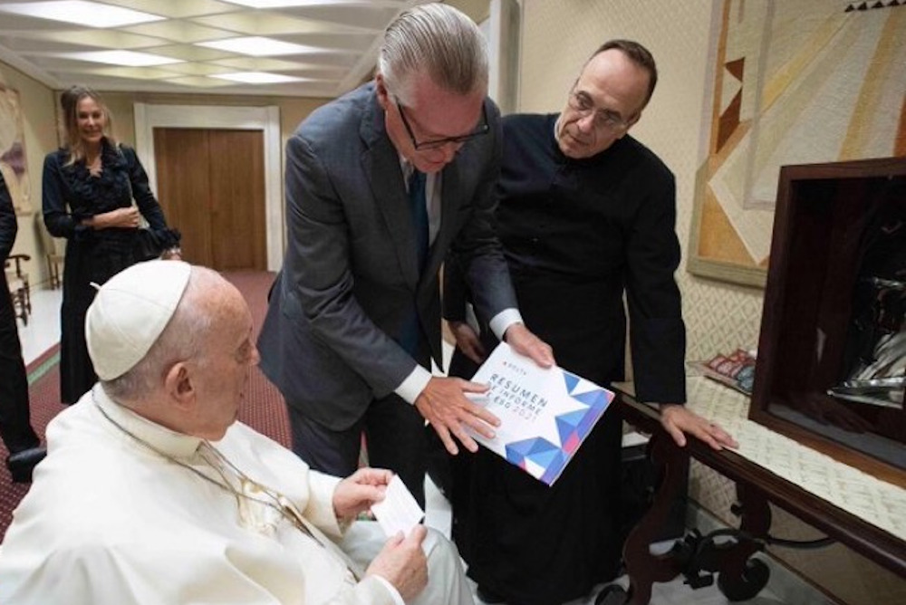 Delta Airlines CEO Ed Bastian and Fr. Jim Sichko of the Diocese of Lexington, Kentucky, meet with Pope Francis on May 18 at the Vatican. (Photo courtesy of Fr. Jim Sichko)