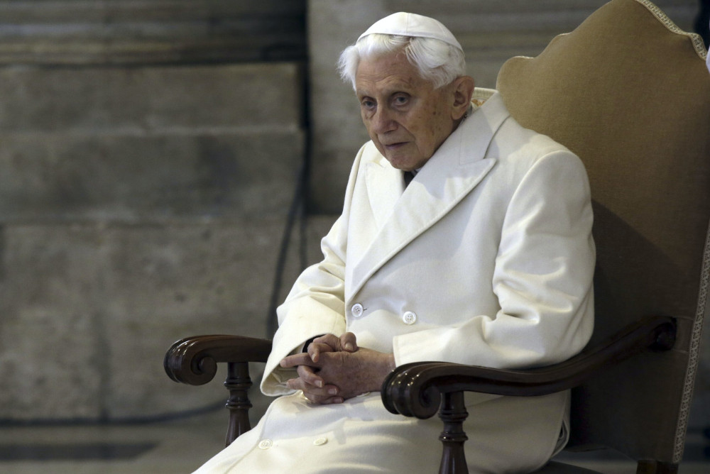 Pope Emeritus Benedict XVI sits in St. Peter's Basilica on Dec. 8, 2015. A long-awaited report on sexual abuse faulted his handling of four cases. (AP/Gregorio Borgia)