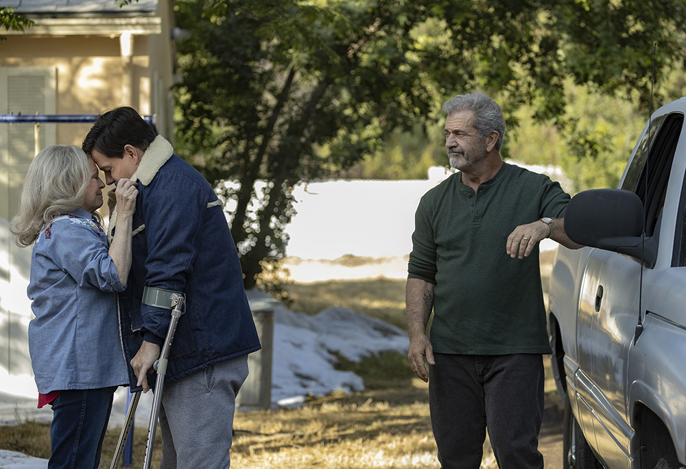 Kathleen Long (Jacki Weaver), from left, Stuart (Mark Wahlberg) and Bill Long (Mel Gibson) in Columbia Pictures' "Father Stu" (Courtesy of Sony Pictures)