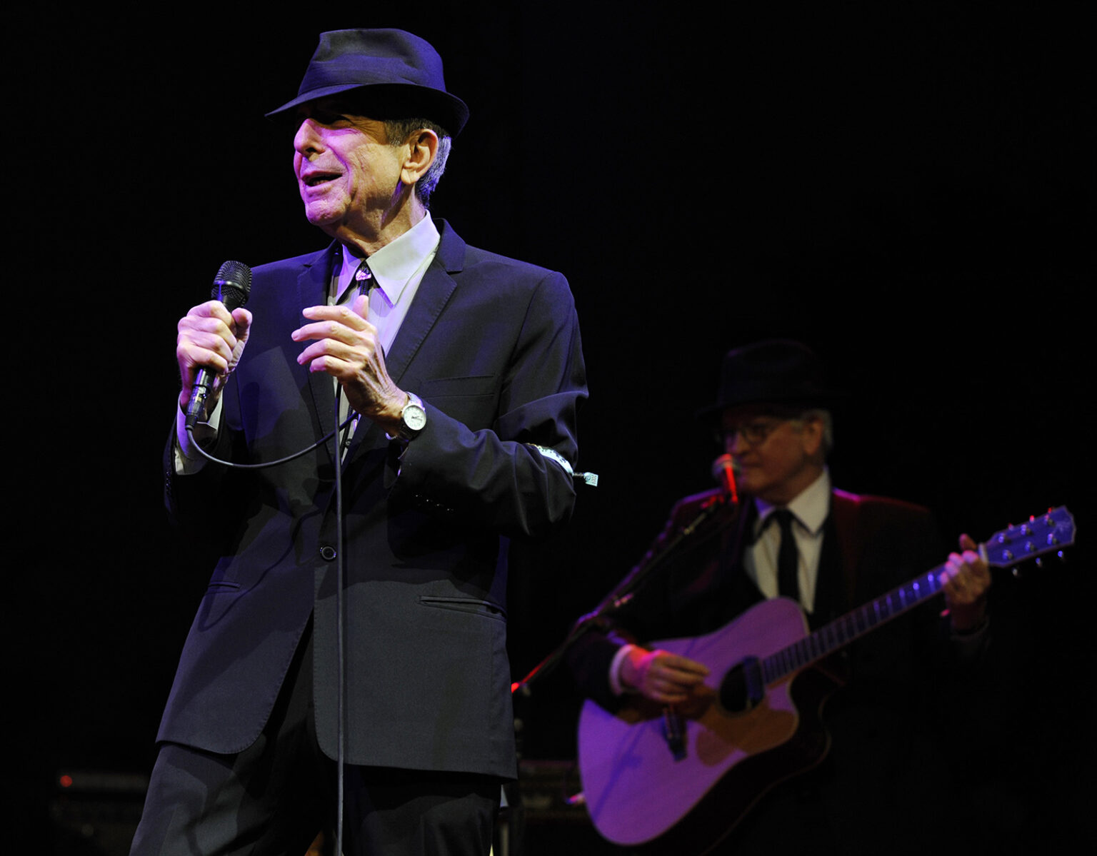 In this April 17, 2009, file photo, Leonard Cohen performs during the Coachella Valley Music & Arts Festival in Indio, Calif. (AP Photo/Chris Pizzello, File)