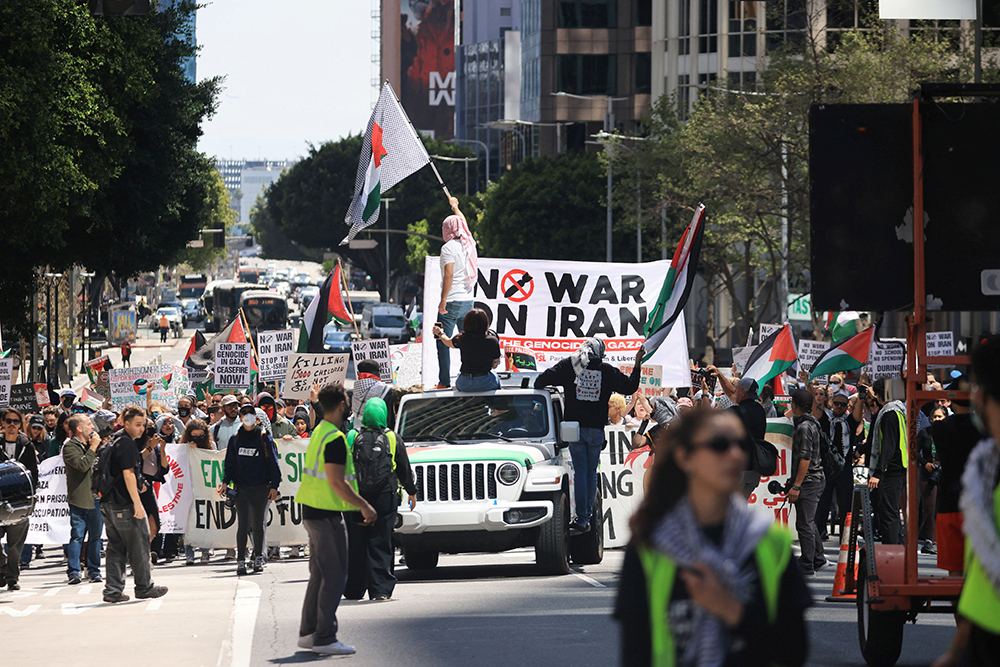 Pro-Palestinian demonstrators march through downtown streets and shopping malls during a "Strike for Gaza" protest in Los Angeles April 15, 2024. (OSV News/Reuters/David Swanson)