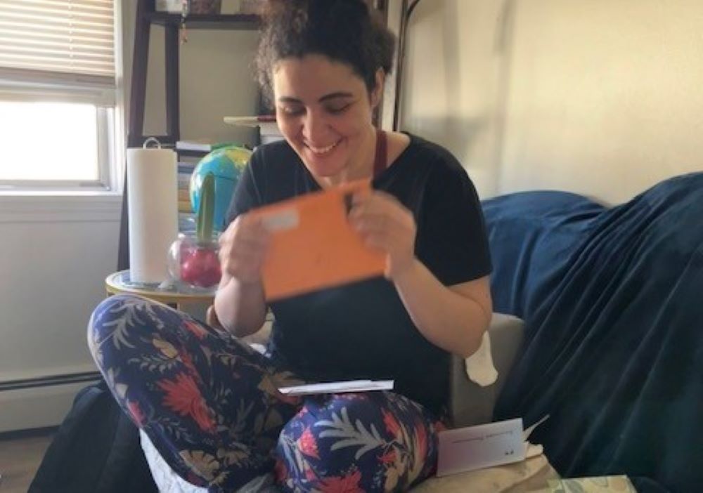 Asrar Jaber opens letters from sisters on her birthday. 