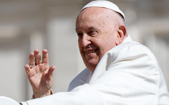 Pope Francis greets people as he rides the popemobile around St. Peter's Square at the Vatican April 25. Francis sent a brief letter to Drachma Parents April 30, responding to their criticism of a Vatican document that condemned gender theory and gender-affirming surgeries. Their original letter to Francis was dated April 23. (CNS/Lola Gomez)